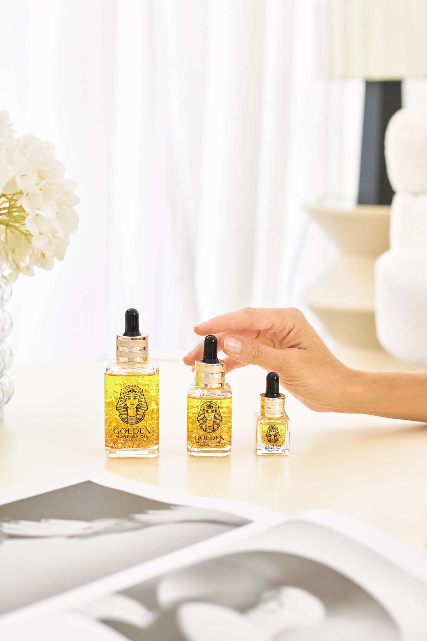 Panya Natural Golden Moringa Oil: Luxurious, rejuvenating organic Thai moringa oil skincare with real 24k gold
