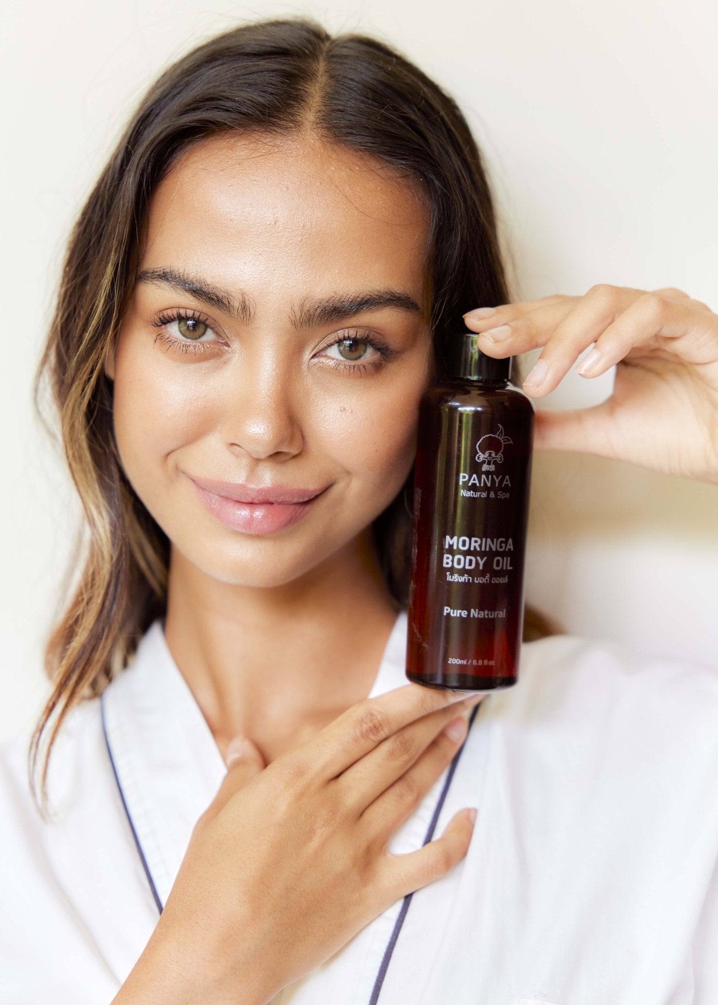 Panya Moringa Body Oil: Thai-grown moringa & other essential oils for deeply hydrated, strengthened skin & boosted collagen production. 100% organic. 