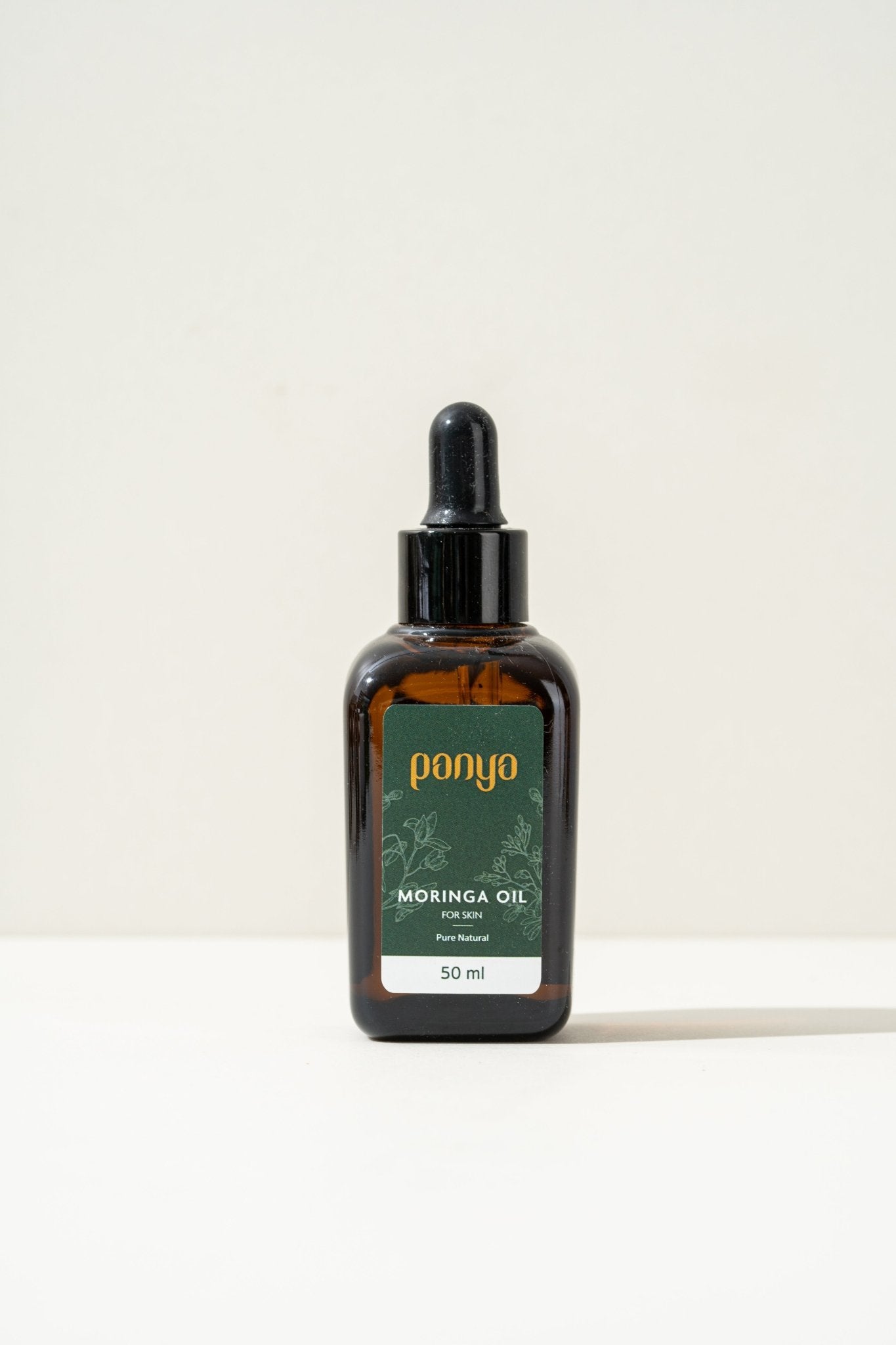 Panya 100% Moringa Oil: vegan Thai-grown cold-pressed virgin moringa oil with 46 antioxidants for strong, smooth skin. 