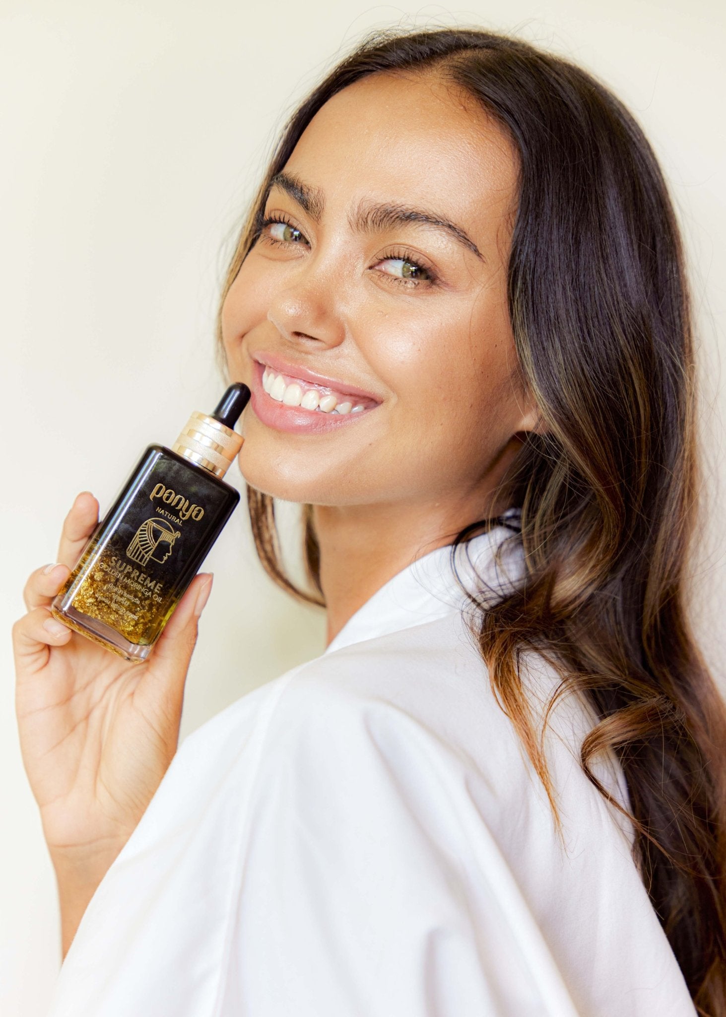 Panya Supreme Golden Moringa Oil: organic, concentrated rejuvenation with 24k gold, Thai moringa & other premium essential oils.